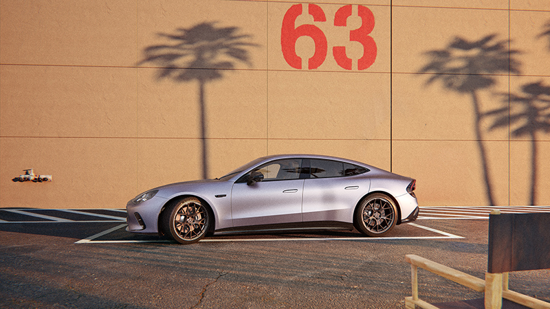 Mercedes AMG GT 53 Coupé 4 portes vu e latérale devant u mur marqué 63