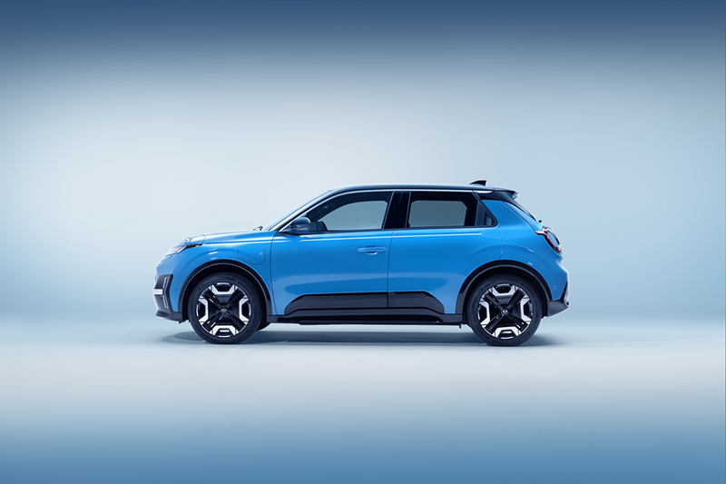 side profile view of All new Nissan Micra in gear blue body color and black roof copie